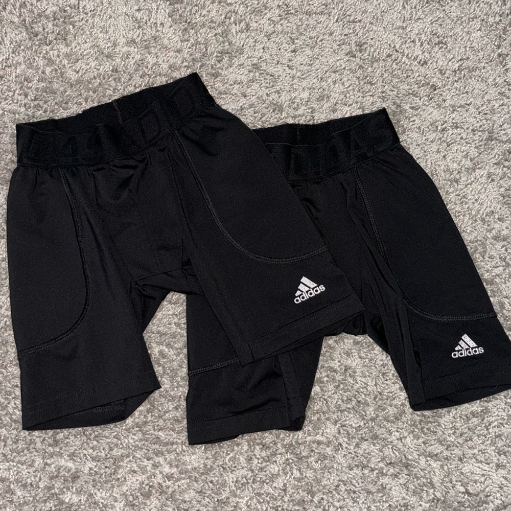 2 Adidas black baseball sliding shorts size XS. Has pocket for cup. Compression